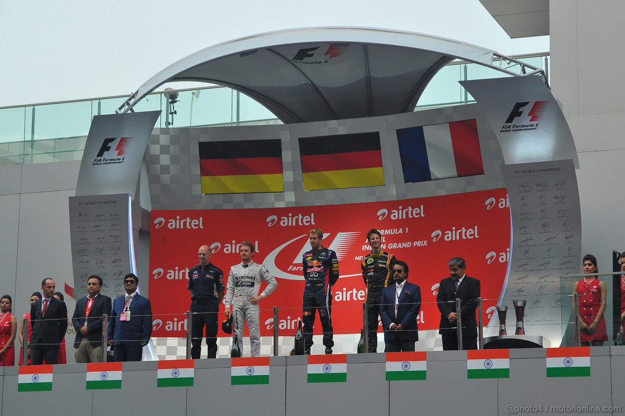 GP INDIA, 27.10.2013- Podium: Sebastian Vettel (GER) Red Bull Racing RB9 (vincitore), Nico Rosberg (GER) Mercedes AMG F1 W04 (secondo) e Romain Grosjean (FRA) Lotus F1 Team E21 (terzo) 