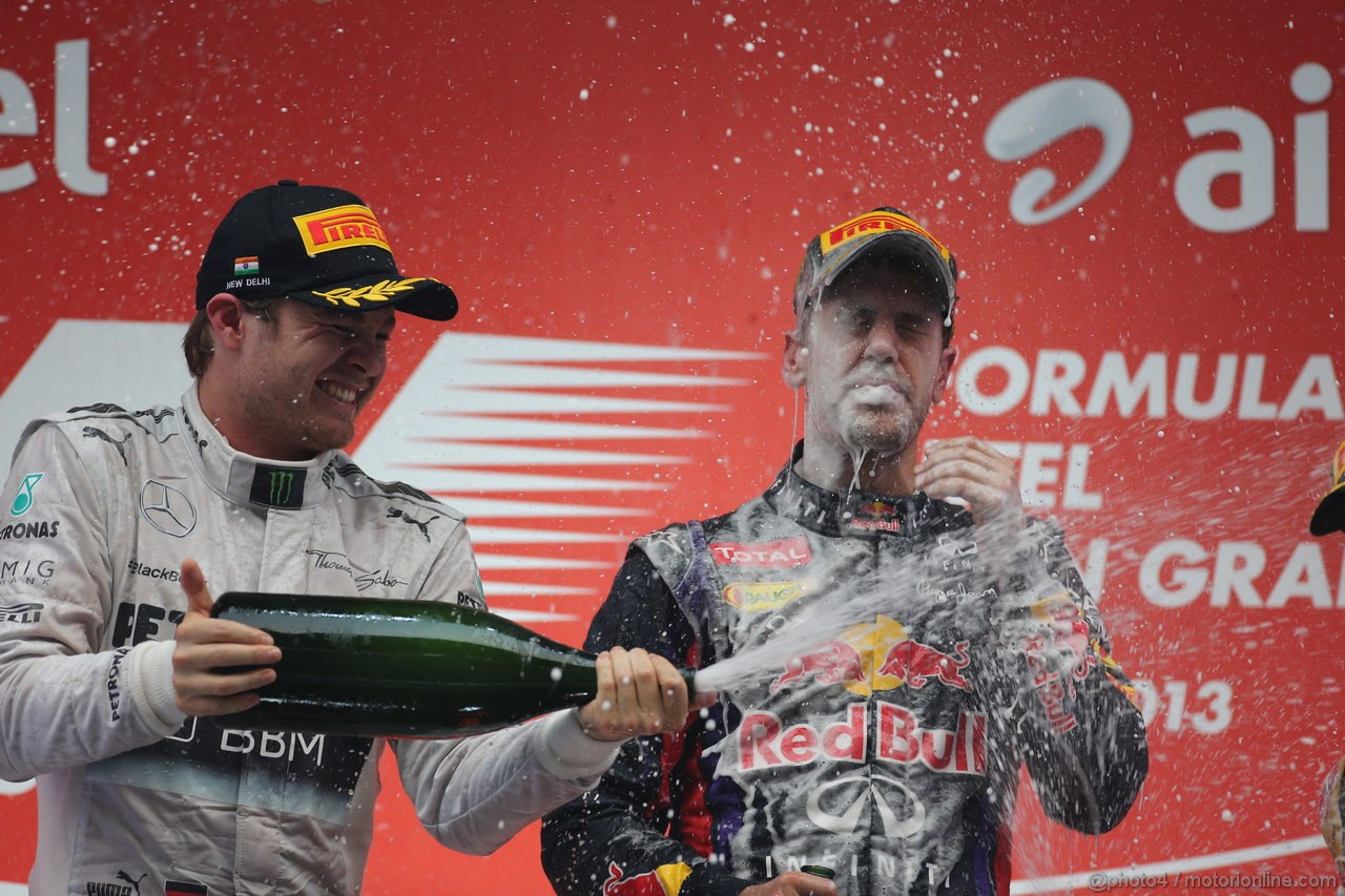 GP INDIA, 27.10.2013- Podium: Sebastian Vettel (GER) Red Bull Racing RB9 (vincitore), Nico Rosberg (GER) Mercedes AMG F1 W04 (secondo) e Romain Grosjean (FRA) Lotus F1 Team E21 (terzo) 
