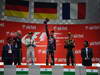 GP INDIA, 27.10.2013- Podium: Sebastian Vettel (GER) Red Bull Racing RB9 (vincitore), Nico Rosberg (GER) Mercedes AMG F1 W04 (secondo) e Romain Grosjean (FRA) Lotus F1 Team E21 (terzo)