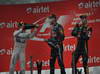 GP INDIA, 27.10.2013- Podium: Sebastian Vettel (GER) Red Bull Racing RB9 (vincitore), Nico Rosberg (GER) Mercedes AMG F1 W04 (secondo) e Romain Grosjean (FRA) Lotus F1 Team E21 (terzo) 