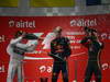 GP INDIA, 27.10.2013- Podium: Sebastian Vettel (GER) Red Bull Racing RB9 (vincitore), Nico Rosberg (GER) Mercedes AMG F1 W04 (secondo) e Romain Grosjean (FRA) Lotus F1 Team E21 (terzo) 