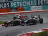 GP MALESIA, 24.03.2013- Gara, Nico Hulkenberg (GER) Sauber F1 Team C32 overtaking Sergio Perez (MEX) McLaren MP4-28 