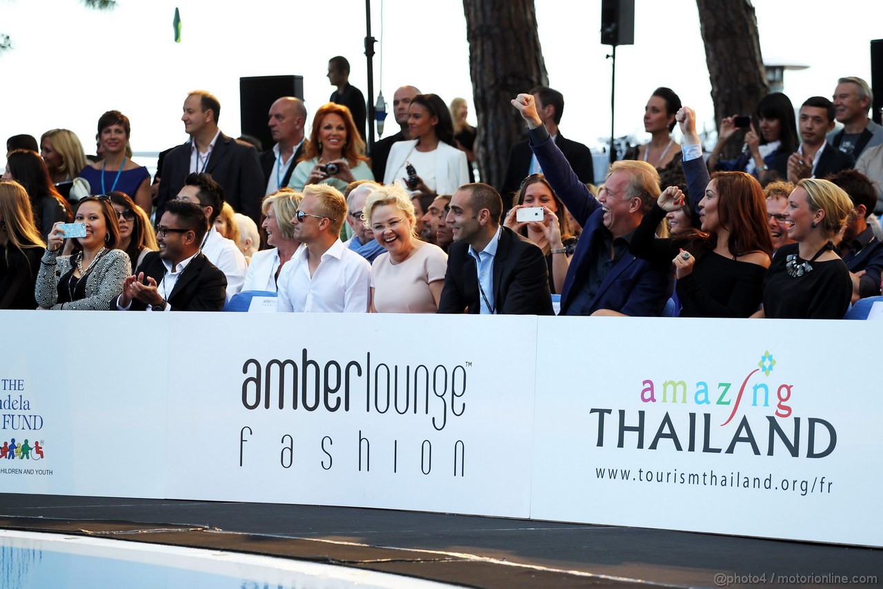 GP MONACO, Heikki Kovalainen (FIN) Caterham F1 Team Reserve Driver with Oksana Kosachenko (RUS) Manager di Vitaly Petrov (RUS), at the Amber Lounge Fashion Show.
