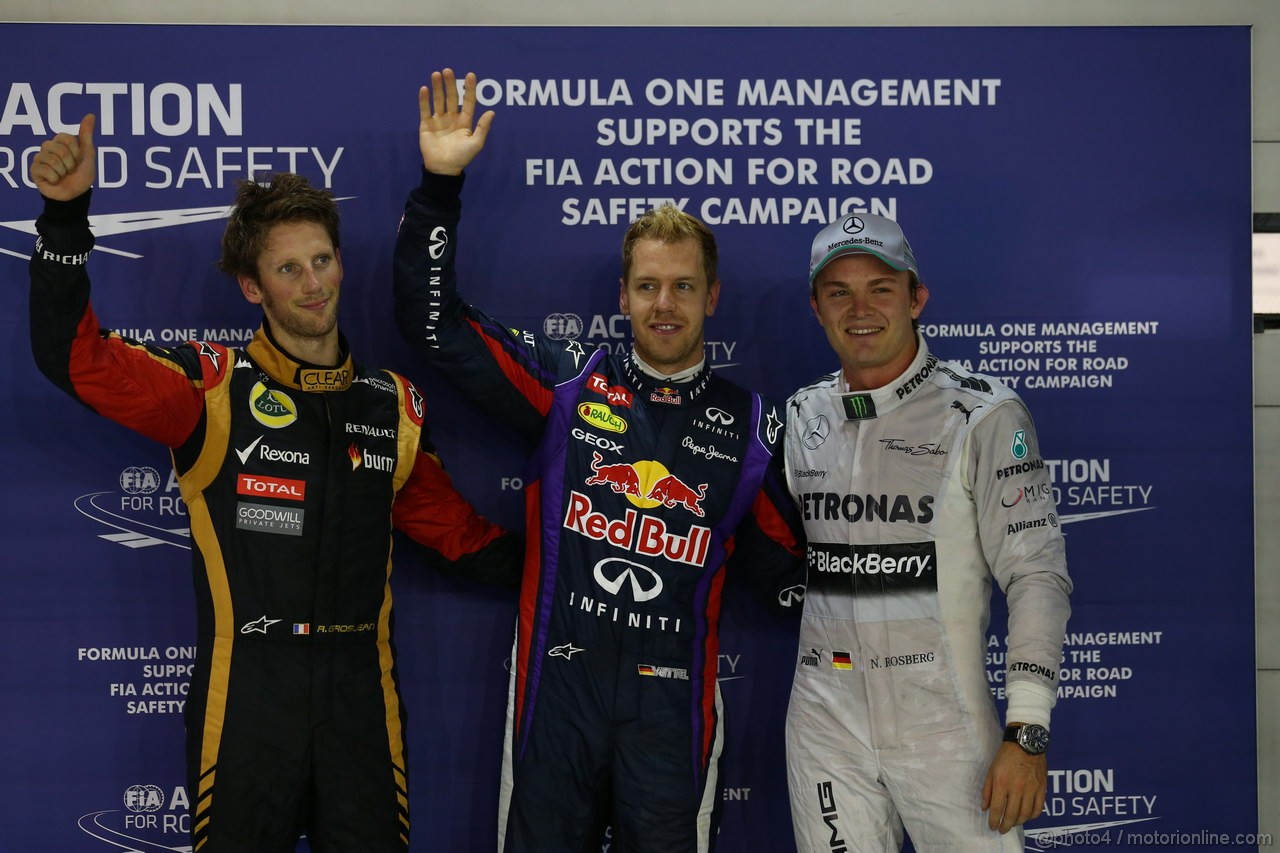 GP SINGAPORE, 21.09.2013- Qualifiche, Pole position Sebastian Vettel (GER) Red Bull Racing RB9, 2nd Nico Rosberg (GER) Mercedes AMG F1 W04 3rd Romain Grosjean (FRA) Lotus F1 Team E213