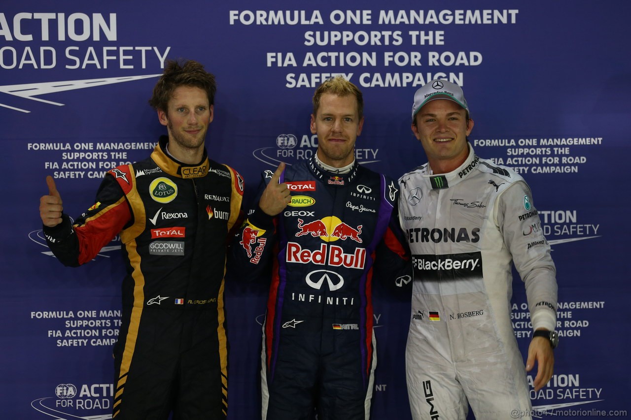 GP SINGAPORE, 21.09.2013- Qualifiche, Pole position Sebastian Vettel (GER) Red Bull Racing RB9, 2nd Nico Rosberg (GER) Mercedes AMG F1 W04 3rd Romain Grosjean (FRA) Lotus F1 Team E213