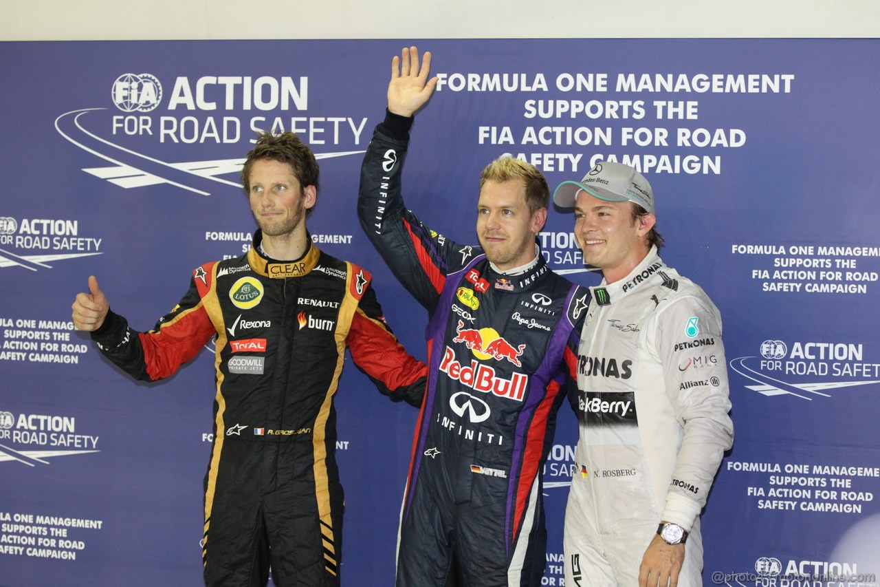GP SINGAPORE, 21.09.2013- Qualifiche, pole Sebastian Vettel (GER) Red Bull Racing RB9, 2nd Nico Rosberg (GER) Mercedes AMG F1 W04, 3rd Romain Grosjean (FRA) Lotus F1 Team E213