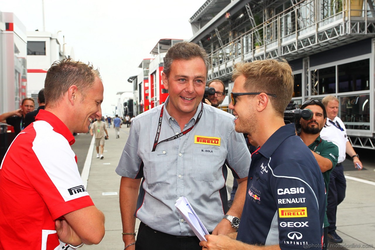 GP UNGHERIA, 25.07.2013- Sebastian Vettel (GER) Red Bull Racing RB9 with Mario Isola (ITA), Sporting Director Pirelli