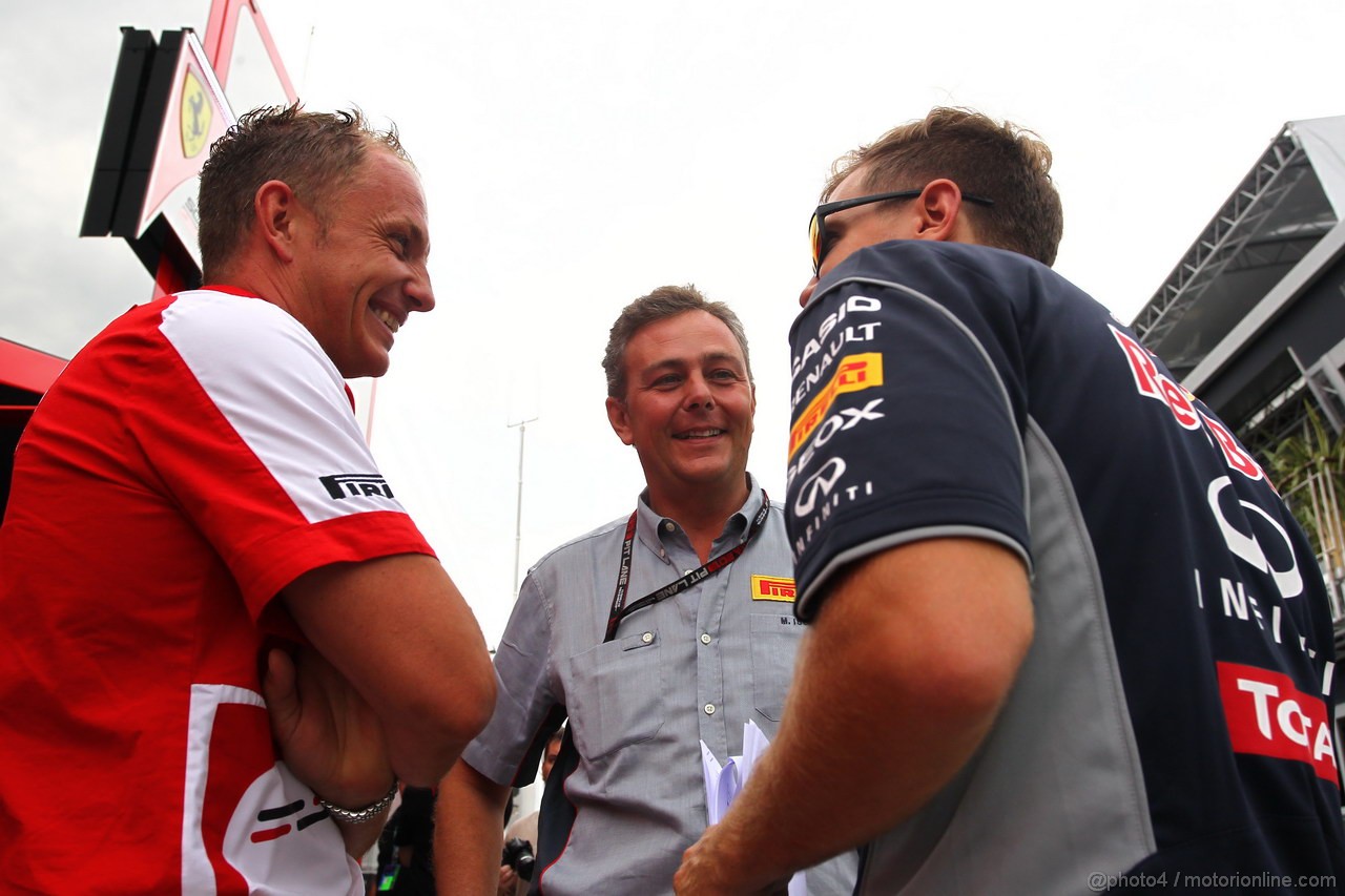GP UNGHERIA, 25.07.2013- Mario Isola (ITA), Sporting Director Pirelli amd Sebastian Vettel (GER) Red Bull Racing RB9