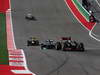 GP USA, 17.11.2013- Gara, Romain Grosjean (FRA) Lotus F1 Team E21 davanti a Lewis Hamilton (GBR) Mercedes AMG F1 W04 