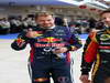 GP USA, 16.11.2013- Qualifiche, Sebastian Vettel (GER) Red Bull Racing RB9 e Romain Grosjean (FRA) Lotus F1 Team E21 