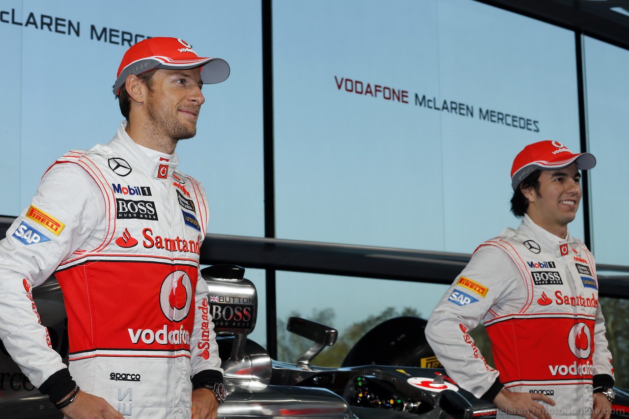 MCLAREN MP4-28, McLaren Technology Centre, Surrey, UK
31st January 2013 
Jenson Button, McLaren e Sergio Perez, McLaren. 
Photo: Vodafone McLaren Mercedes (Copyright Free FOR EDITORIAL USE ONLY) 
ref: Digital Image _00P5444
