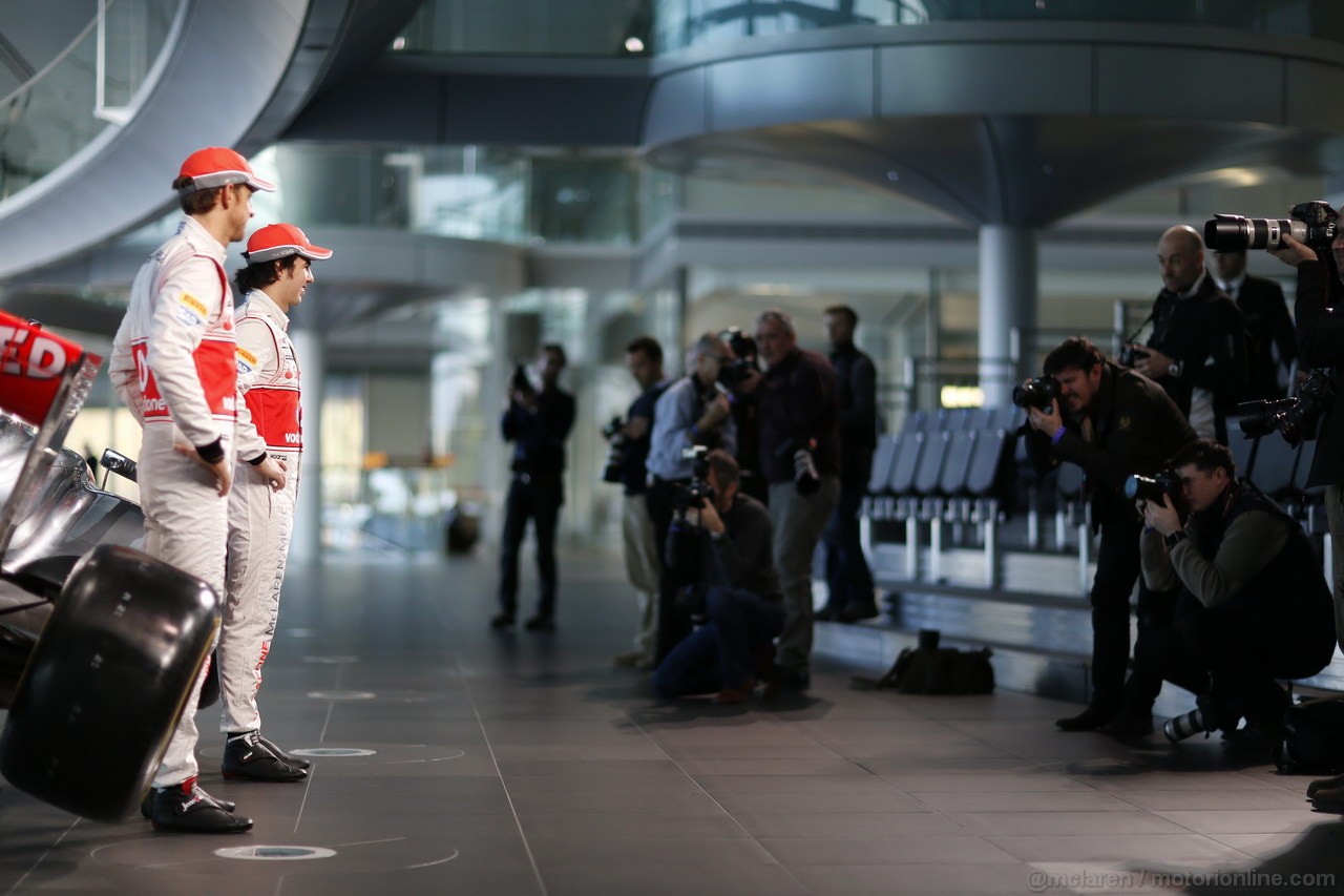 MCLAREN MP4-28, McLaren Technology Centre, Surrey, UK
31st January 2013 
Jenson Button, McLaren e Sergio Perez, McLaren. 
Photo: Vodafone McLaren Mercedes (Copyright Free FOR EDITORIAL USE ONLY) 
ref: Digital Image _00P5464