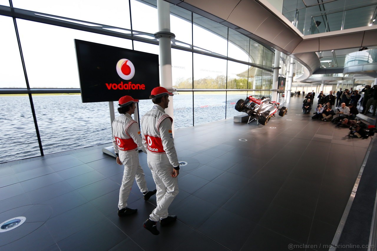 MCLAREN MP4-28, McLaren Technology Centre, Surrey, UK
31st January 2013 
Jenson Button, McLaren e Sergio Perez, McLaren. 
Photo: Vodafone McLaren Mercedes (Copyright Free FOR EDITORIAL USE ONLY) 
ref: Digital Image _00P5573