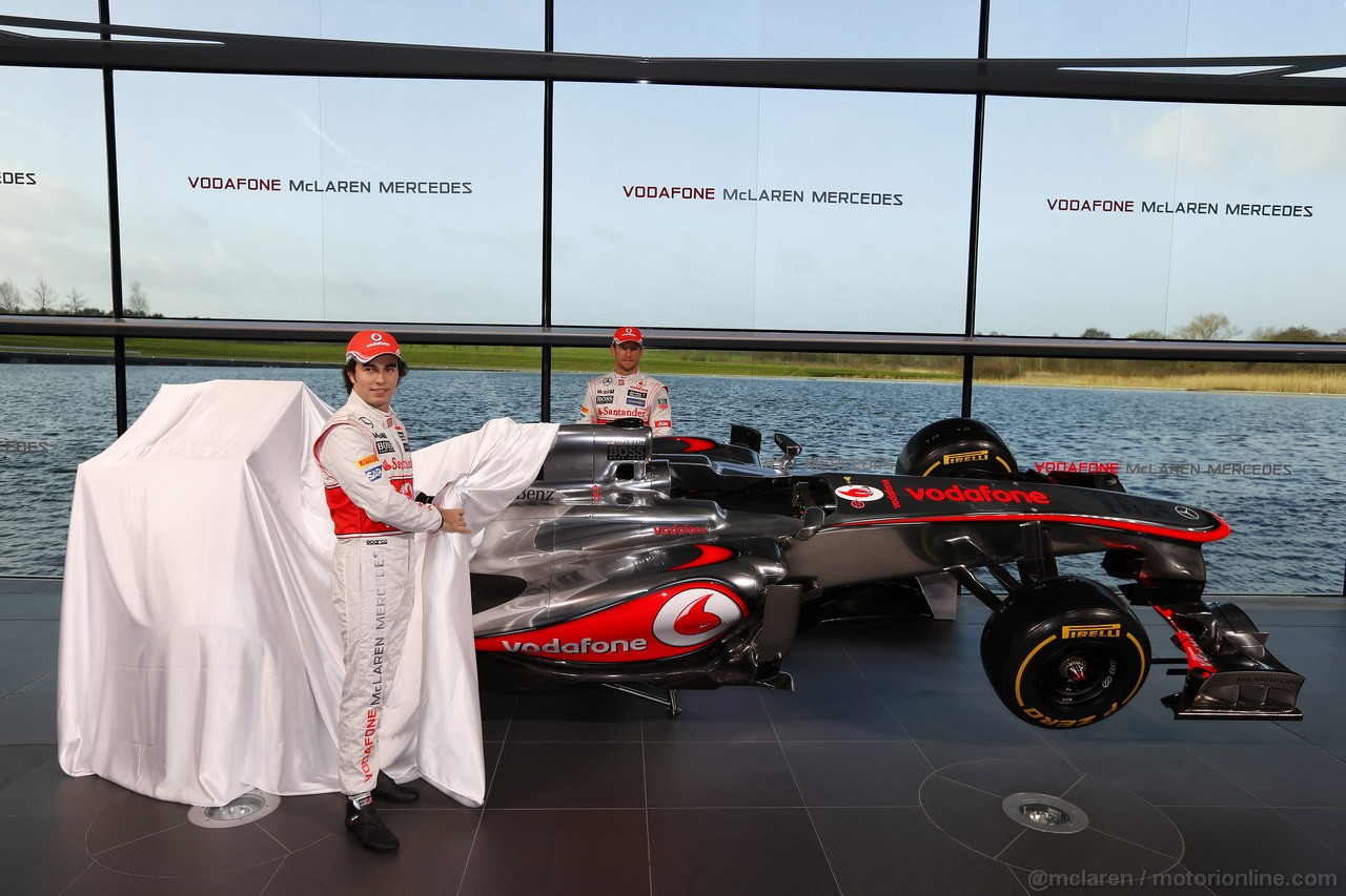 MCLAREN MP4-28, McLaren Technology Centre, Surrey, UK
31st January 2013 
Sergio Perez, McLaren e Jenson Button, McLaren.
Photo: Vodafone McLaren Mercedes (Copyright Free FOR EDITORIAL USE ONLY) 
ref: Digital Image _N7T0090