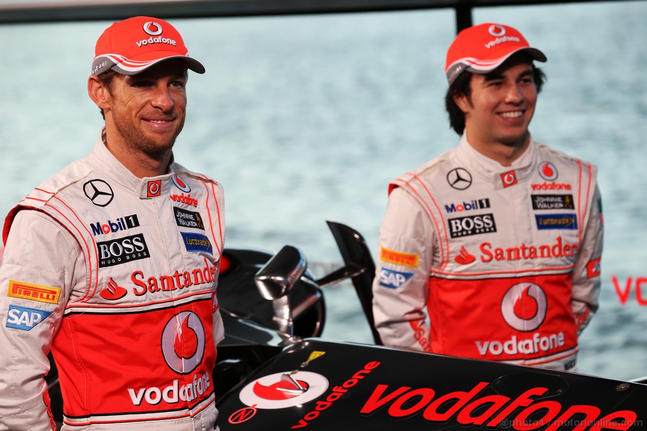 MCLAREN MP4-28, (L to R): Jenson Button (GBR) McLaren with team mate Sergio Perez (MEX) McLaren.
31.01.2013. McLaren MP4-28 Launch, McLaren Technology Centre, Woking, England.
