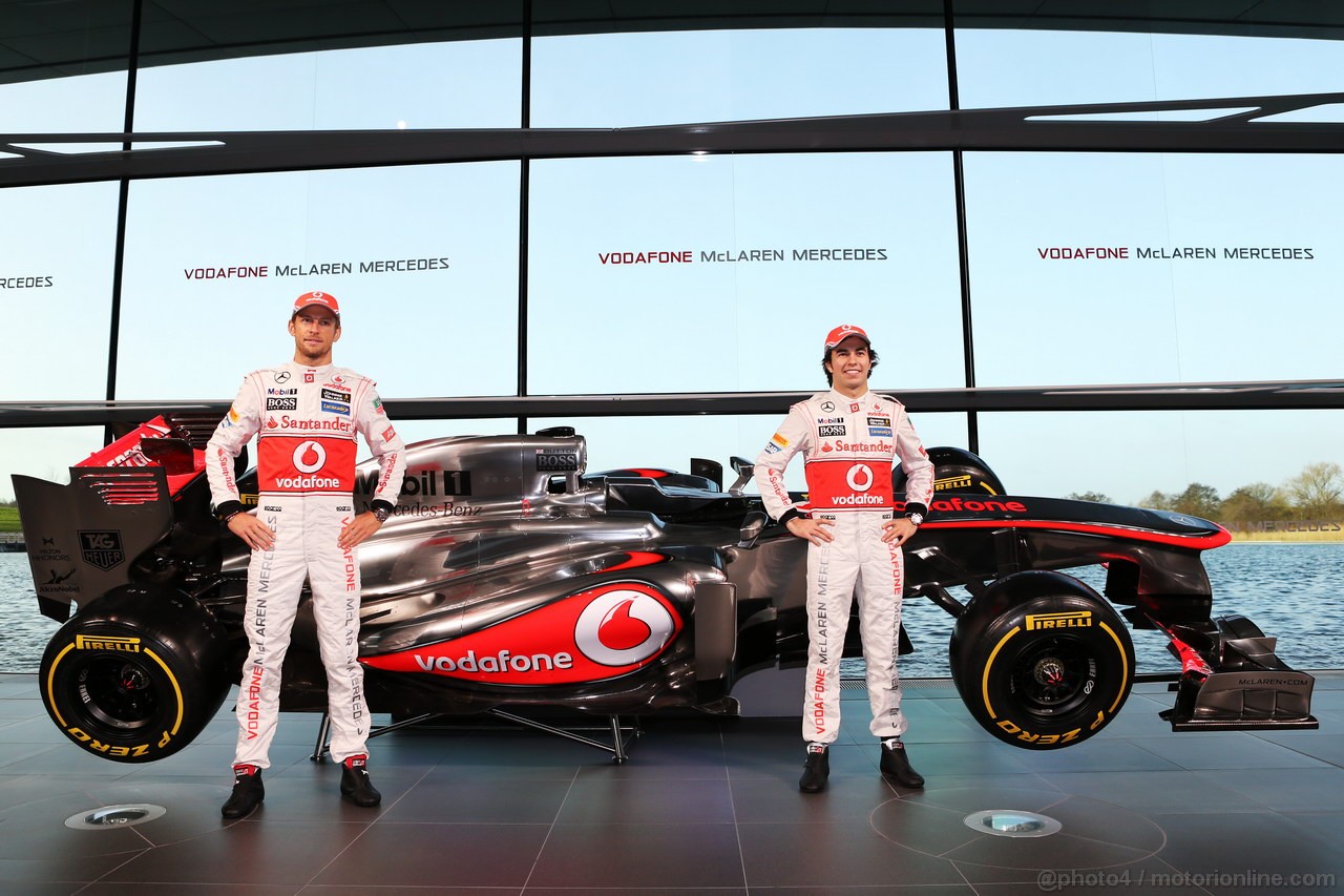 MCLAREN MP4-28, (L to R): Jenson Button (GBR) McLaren e Sergio Perez (MEX) McLaren with the new McLaren MP4-28.
31.01.2013. McLaren MP4-28 Launch, McLaren Technology Centre, Woking, England.
