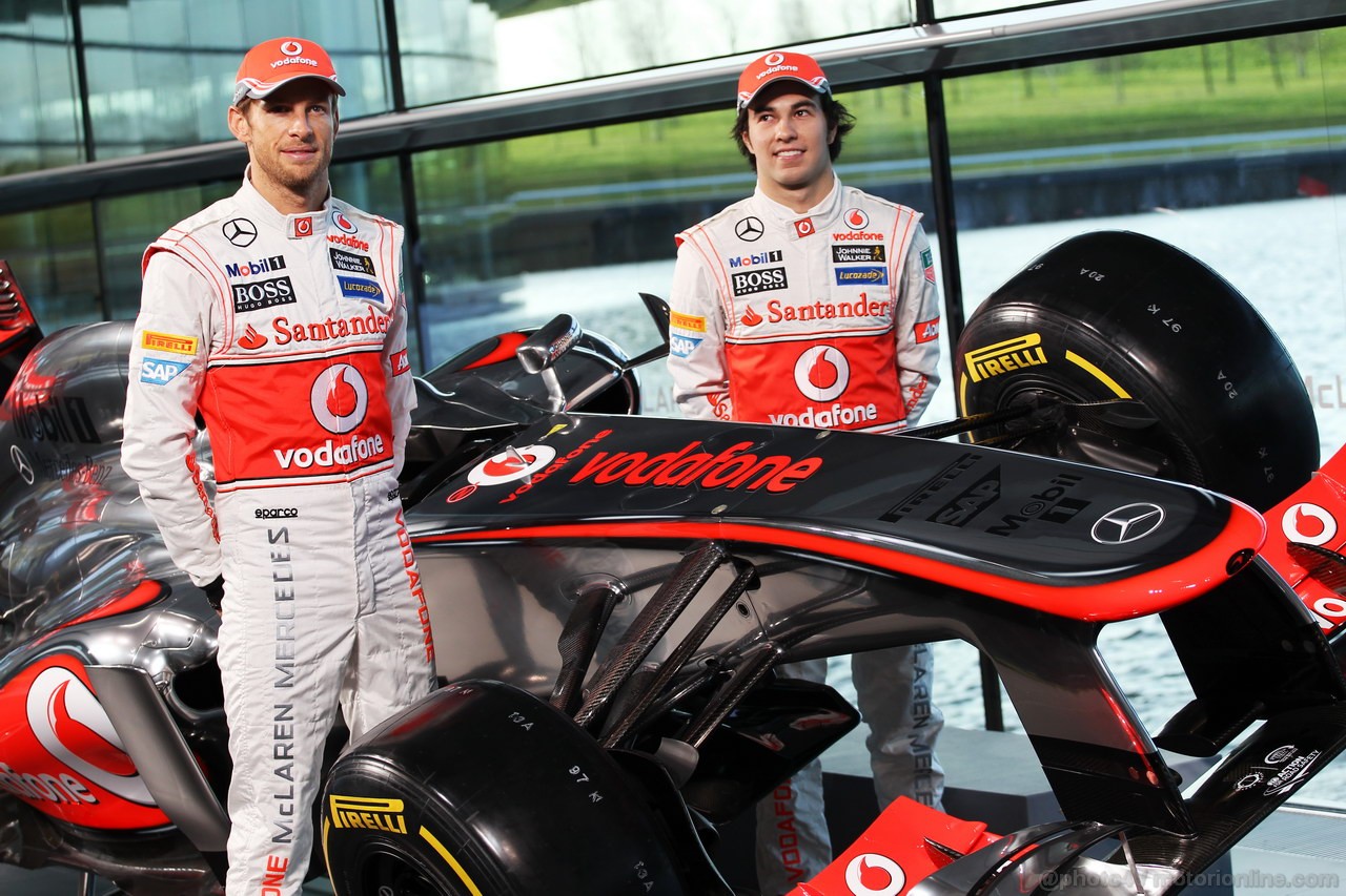 MCLAREN MP4-28, (L to R): Jenson Button (GBR) McLaren e Sergio Perez (MEX) McLaren with the new McLaren MP4-28.
31.01.2013. McLaren MP4-28 Launch, McLaren Technology Centre, Woking, England.

