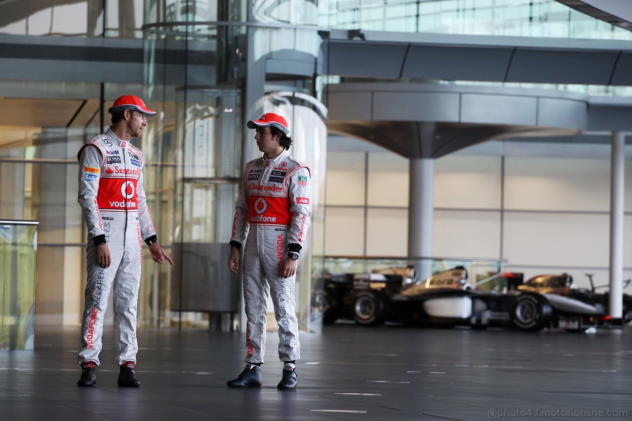 MCLAREN MP4-28, (L to R): Jenson Button (GBR) McLaren with team mate Sergio Perez (MEX) McLaren.
31.01.2013. McLaren MP4-28 Launch, McLaren Technology Centre, Woking, England.
