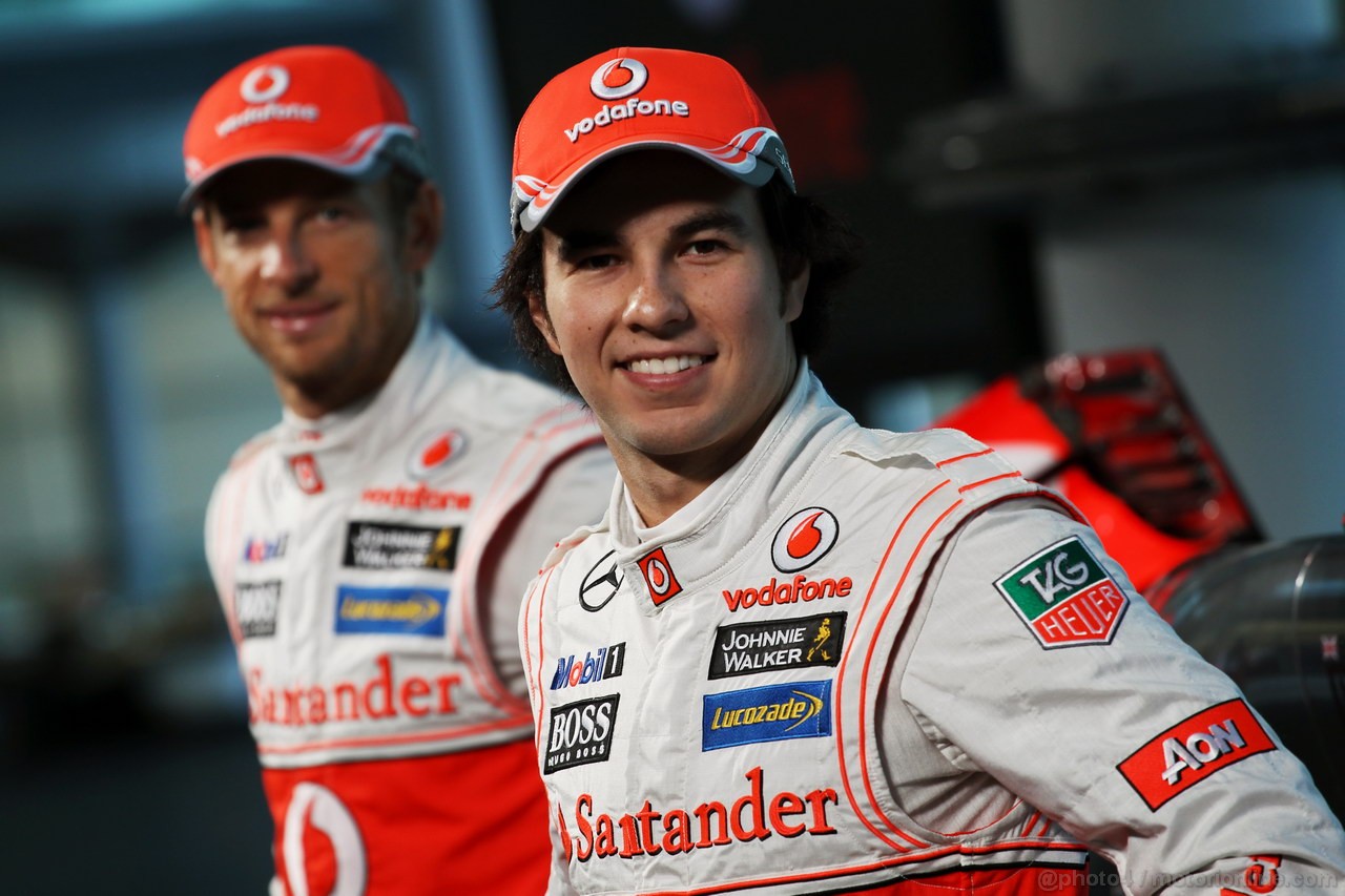 MCLAREN MP4-28, (L to R): Jenson Button (GBR) McLaren with team mate Sergio Perez (MEX) McLaren.
31.01.2013. McLaren MP4-28 Launch, McLaren Technology Centre, Woking, England.
