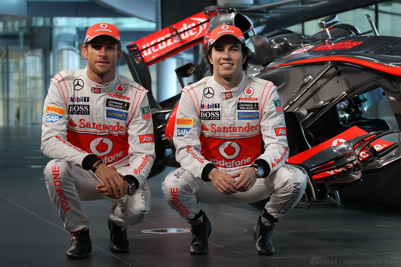 MCLAREN MP4-28, (L to R): Jenson Button (GBR) McLaren with team mate Sergio Perez (MEX) McLaren.
31.01.2013. McLaren MP4-28 Launch, McLaren Technology Centre, Woking, England.
