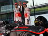 MCLAREN MP4-28, (L to R): Jenson Button (GBR) McLaren, Martin Whitmarsh (GBR) McLaren Chief Executive Officer e Sergio Perez (MEX) McLaren unveil the new McLaren MP4-28.
31.01.2013. McLaren MP4-28 Launch, McLaren Technology Centre, Woking, England.
