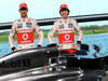 MCLAREN MP4-28, (L to R): Jenson Button (GBR) McLaren with team mate Sergio Perez (MEX) McLaren e the new McLaren MP4-28.
31.01.2013. McLaren MP4-28 Launch, McLaren Technology Centre, Woking, England.

