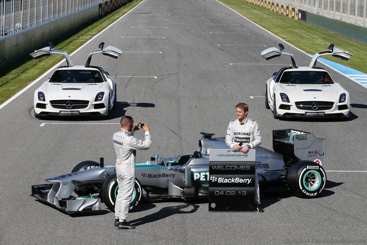 MERCEDES F1 W04, (L to R): Lewis Hamilton (GBR) Mercedes AMG F1 e team mate Nico Rosberg (GER) Mercedes AMG F1 with the new Mercedes AMG F1 W04 e promote new Blackberry sponsorship for the team.

