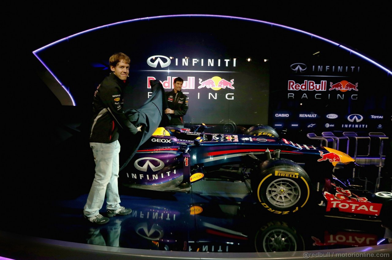 RED BULL RB9, MILTON KEYENES, ENGLAND - FEBRUARY 03: Drivers Mark Webber of Australia e Sebastian Vettel of Germany reveal the new car during the Infiniti Red Bull Racing RB9 launch on February 3, 2013 in Milton Keyenes, England. (Photo by Mark Thompson/Getty Images)