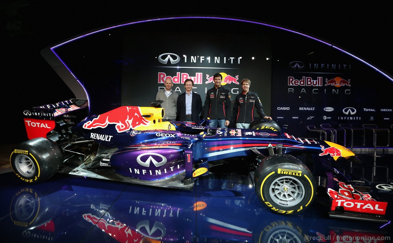 RED BULL RB9, MILTON KEYENES, ENGLAND - FEBRUARY 03:  (L-R) Adrian Newey, Chief Technical Officer, Christian Horner, Team Principle, Mark Webber of Australia e Sebastian Vettel of Germany pose along side the new car during the Infiniti Red Bull Racing RB9 launch on February 3, 2013 in Milton Keynes, England.  (Photo by Mark Thompson/Getty Images)