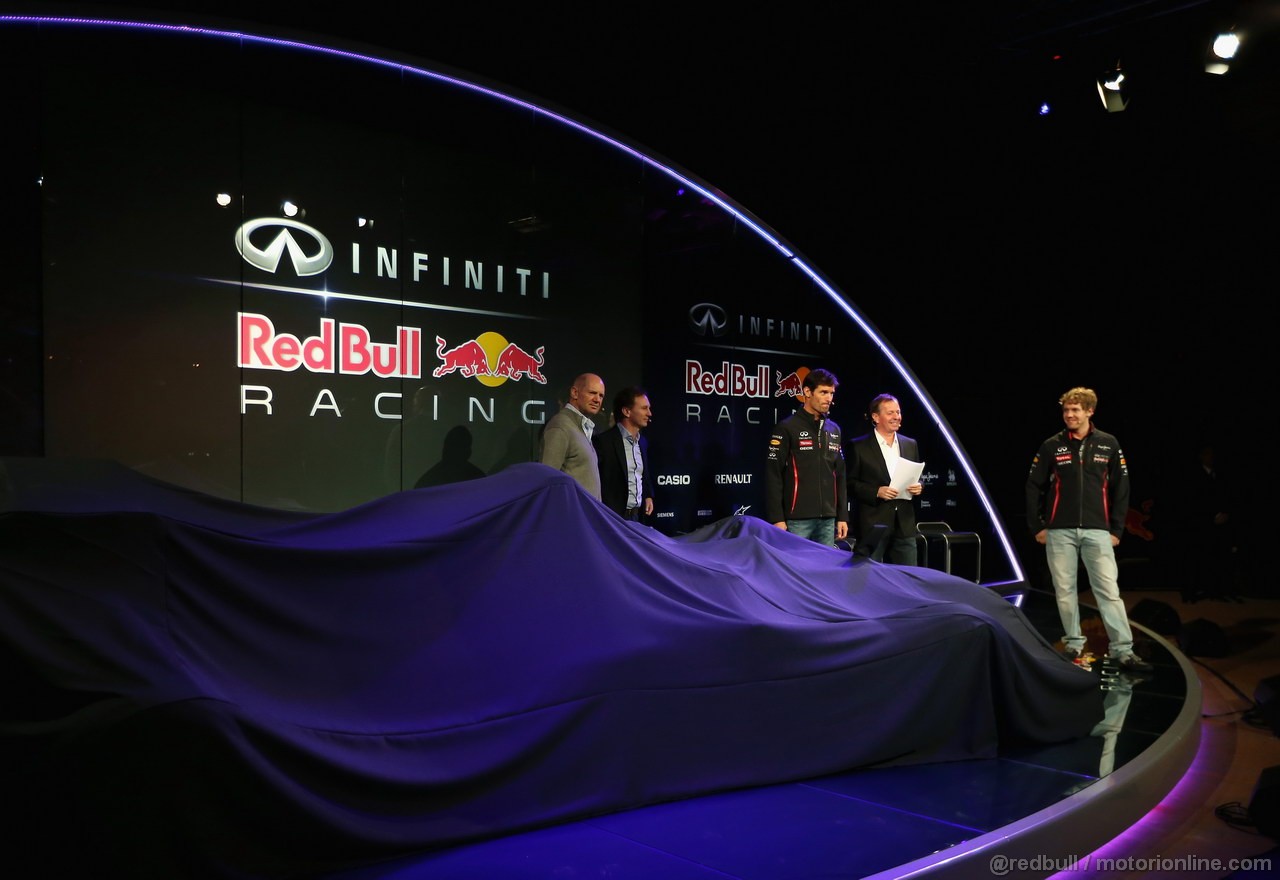 RED BULL RB9, MILTON KEYENES, ENGLAND - FEBRUARY 03: (L-R) Adrian Newey, Chief Technical Officer, Christian Horner, Team Principle, Mark Webber of Australia e Sebastian Vettel of Germany prepare to unveil the new car during the Infiniti Red Bull Racing RB9 launch on February 3, 2013 in Milton Keynes, England. (Photo by Mark Thompson/Getty Images)