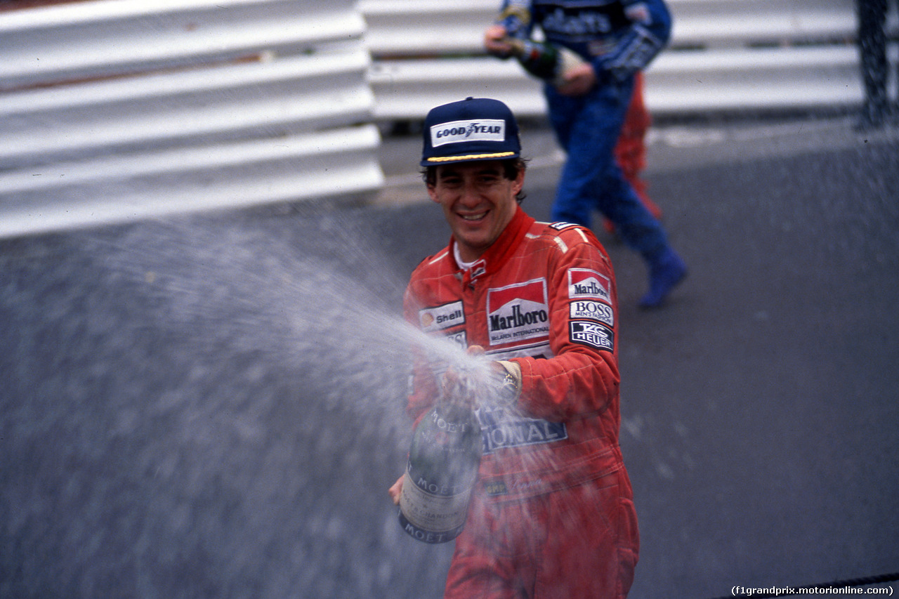 AYRTON SENNA, Ayrton Senna da Silva (BRA) McLaren celebrates 1st position with Champagne