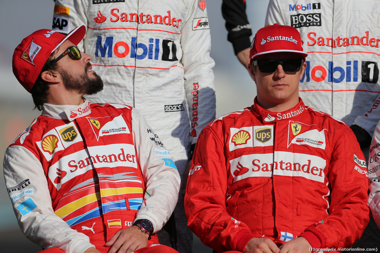 GP ABU DHABI, 23.11.2014- Fernando Alonso (ESP) Ferrari F14-T e Kimi Raikkonen (FIN) Ferrari F14-T