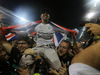 GP ABU DHABI, 23.11.2014- Gara, Festeggiamenti, Lewis Hamilton (GBR) Mercedes AMG F1 W05 F1 World Champion 2014 e secondo Nico Rosberg (GER) Mercedes AMG F1 W05