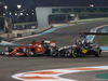 GP ABU DHABI, 23.11.2014- Gara, Fernando Alonso (ESP) Ferrari F14-T e Jenson Button (GBR) McLaren Mercedes MP4-29