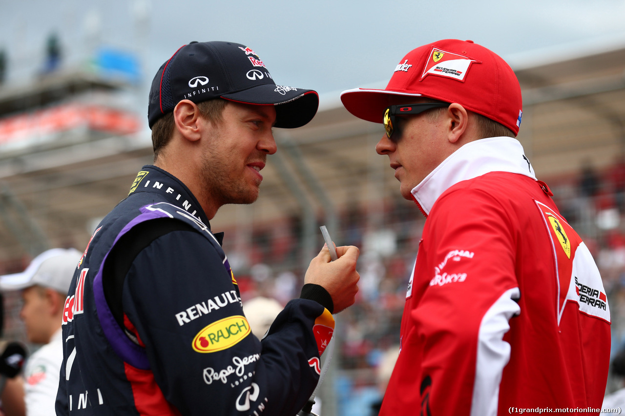 GP AUSTRALIA, 16.03.2014- Sebastian Vettel (GER) Red Bull Racing RB10 e Kimi Raikkonen (FIN) Ferrari F14-T
