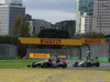 GP AUSTRALIA, 16.03.2014- Gara, Daniil Kvyat (RUS) Scuderia Toro Rosso STR9 davanti a Jenson Button (GBR) McLaren Mercedes MP4-29