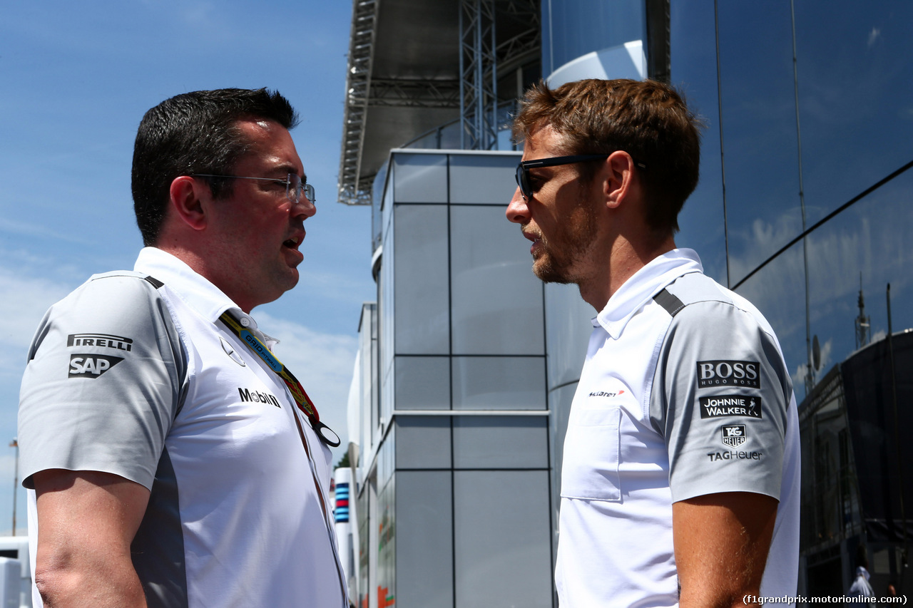 GP AUSTRIA, 22.06.2014- Eric Boullier (FRA) McLaren Racing Director. e Jenson Button (GBR) McLaren Mercedes MP4-29
