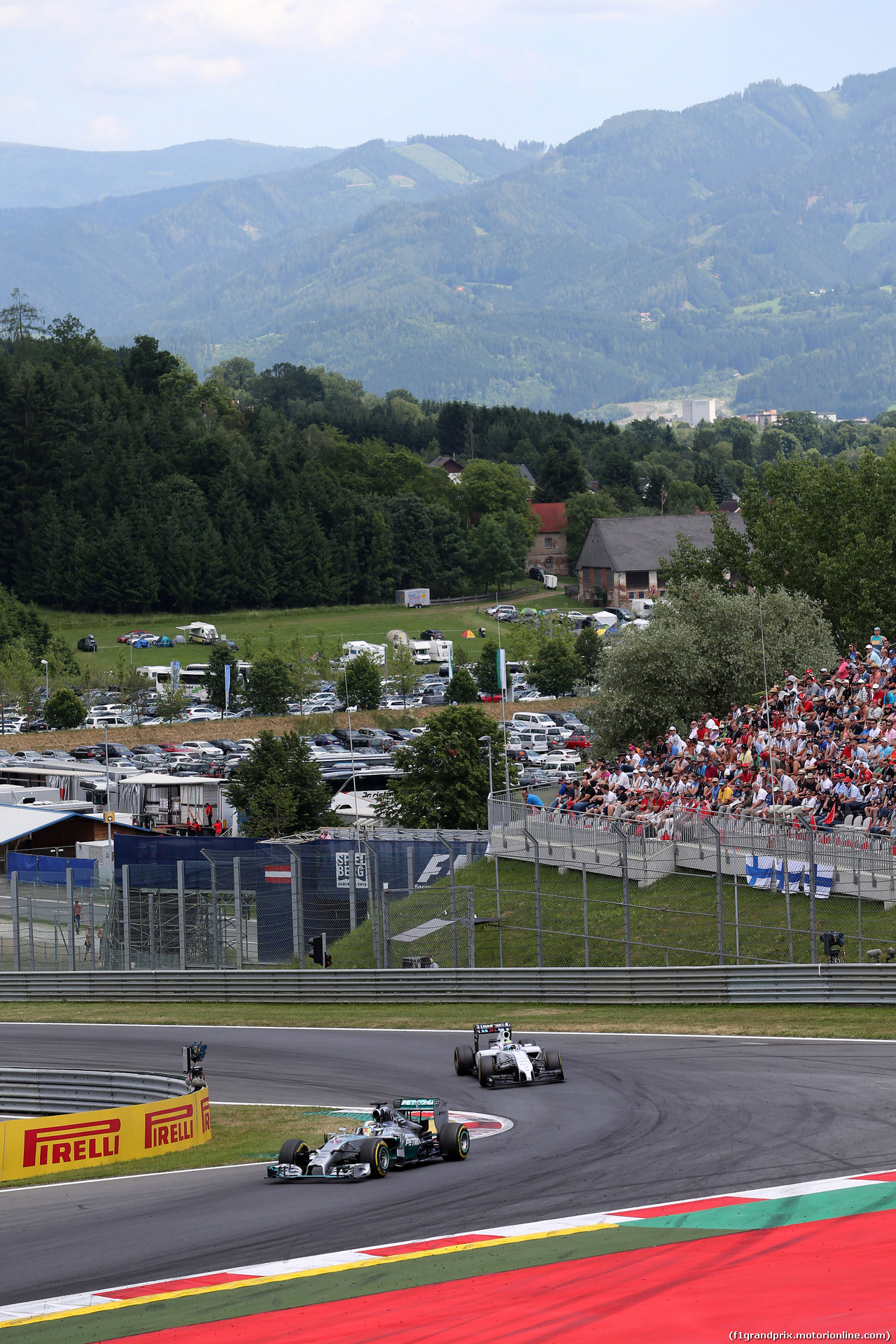 GP AUSTRIA, 22.06.2014- Gara, Lewis Hamilton (GBR) Mercedes AMG F1 W05 davanti a Valtteri Bottas (FIN) Williams F1 Team FW36