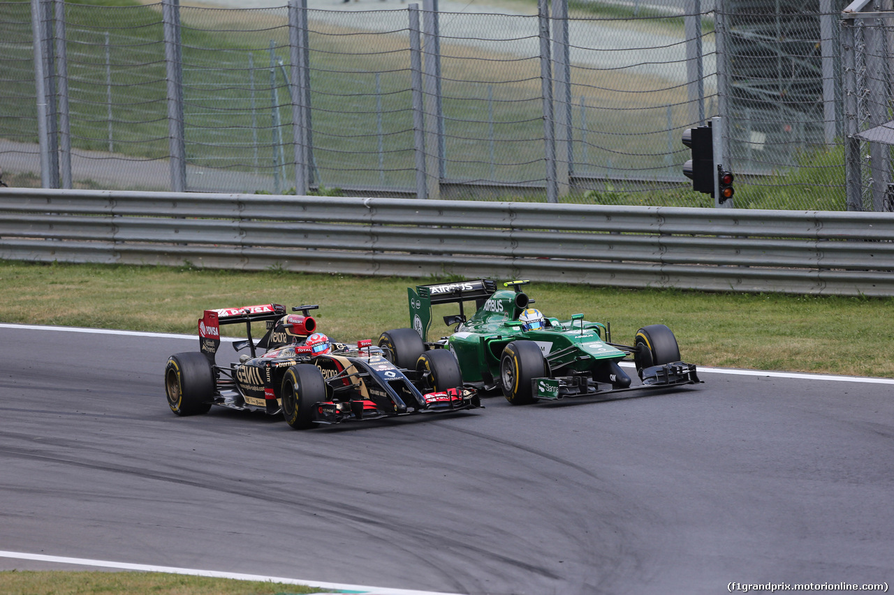 GP AUSTRIA, 22.06.2014- Gara, Jean-Eric Vergne (FRA) Scuderia Toro Rosso STR9 e Marcus Ericsson (SUE) Caterham F1 Team CT-04