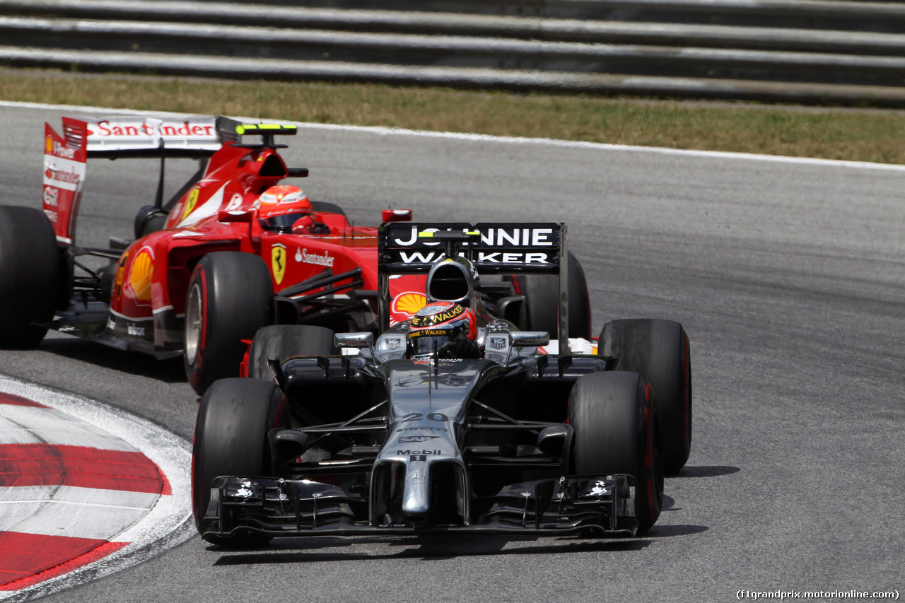 GP AUSTRIA, 22.06.2014- Gara, Kevin Magnussen (DEN) McLaren Mercedes MP4-29 davanti a Kimi Raikkonen (FIN) Ferrari F14-T