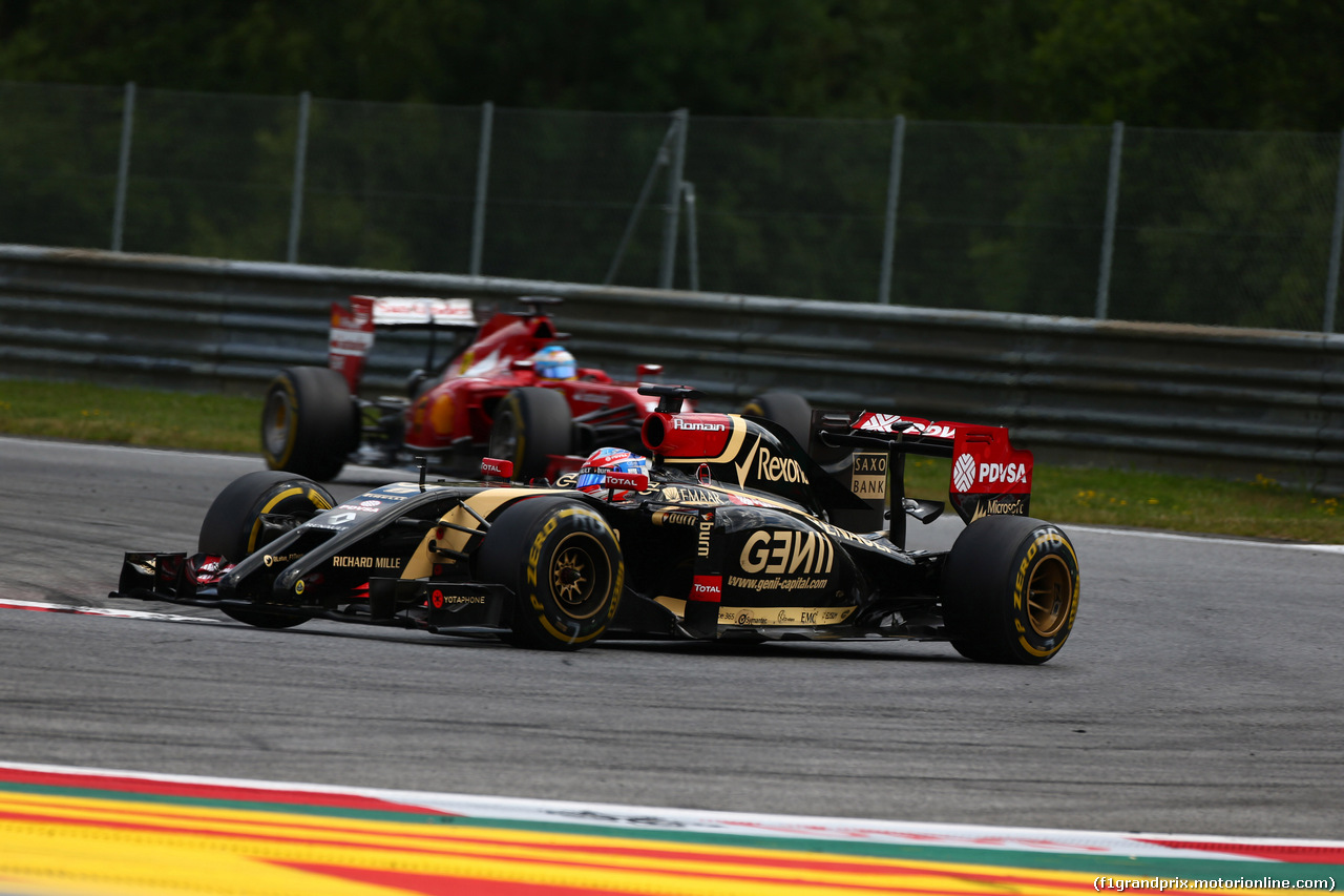 GP AUSTRIA, 22.06.2014- Gara, Romain Grosjean (FRA) Lotus F1 Team E22 davanti a Fernando Alonso (ESP) Ferrari F14-T