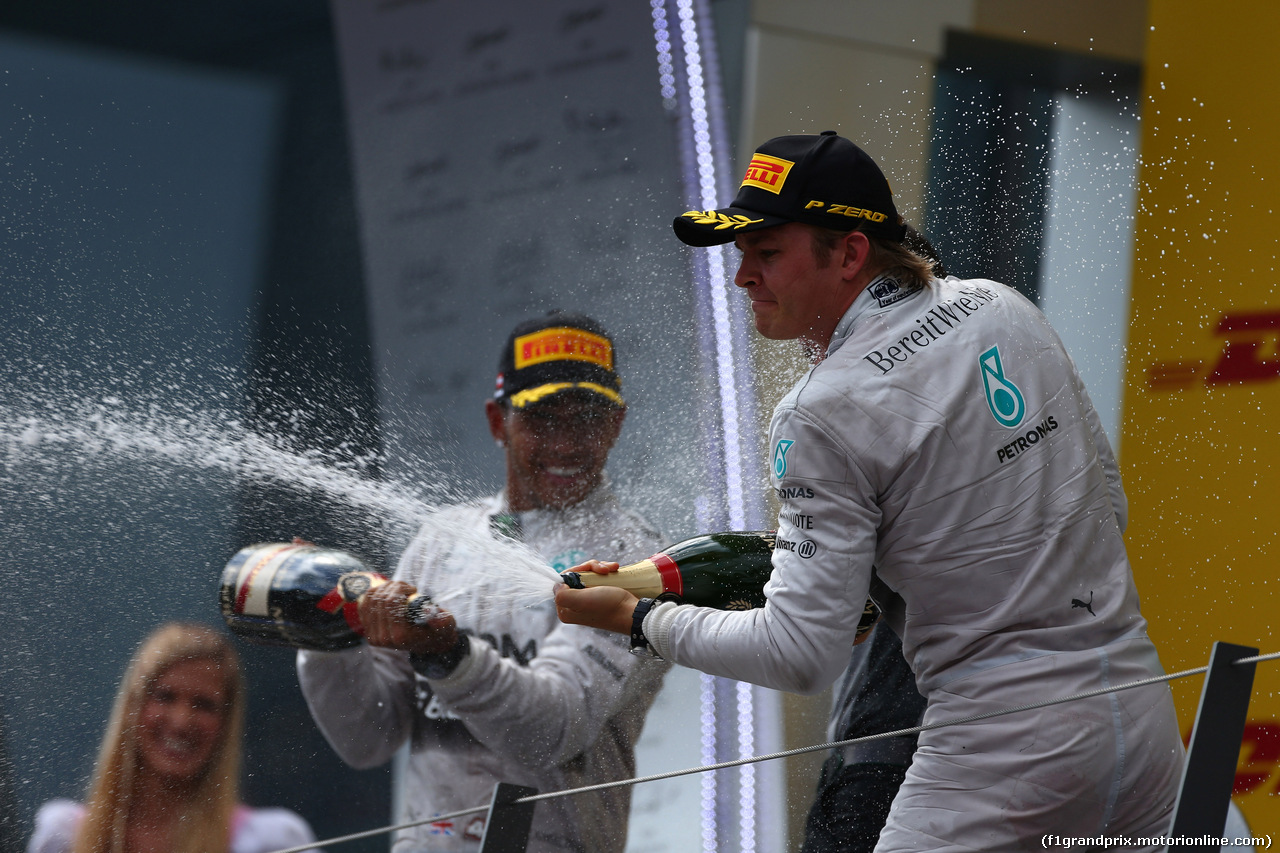 GP AUSTRIA, 22.06.2014- Gara, secondo Lewis Hamilton (GBR) Mercedes AMG F1 W05 e Nico Rosberg (GER) Mercedes AMG F1 W05 vincitore