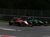 GP AUSTRIA, 22.06.2014- Gara, Max Chilton (GBR), Marussia F1 Team MR03 e Kamui Kobayashi (JAP) Caterham F1 Team CT-04