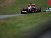 GP AUSTRIA, 21.06.2014- Free Practice 3, Romain Grosjean (FRA) Lotus F1 Team E22 e Nico Rosberg (GER) Mercedes AMG F1 W05
