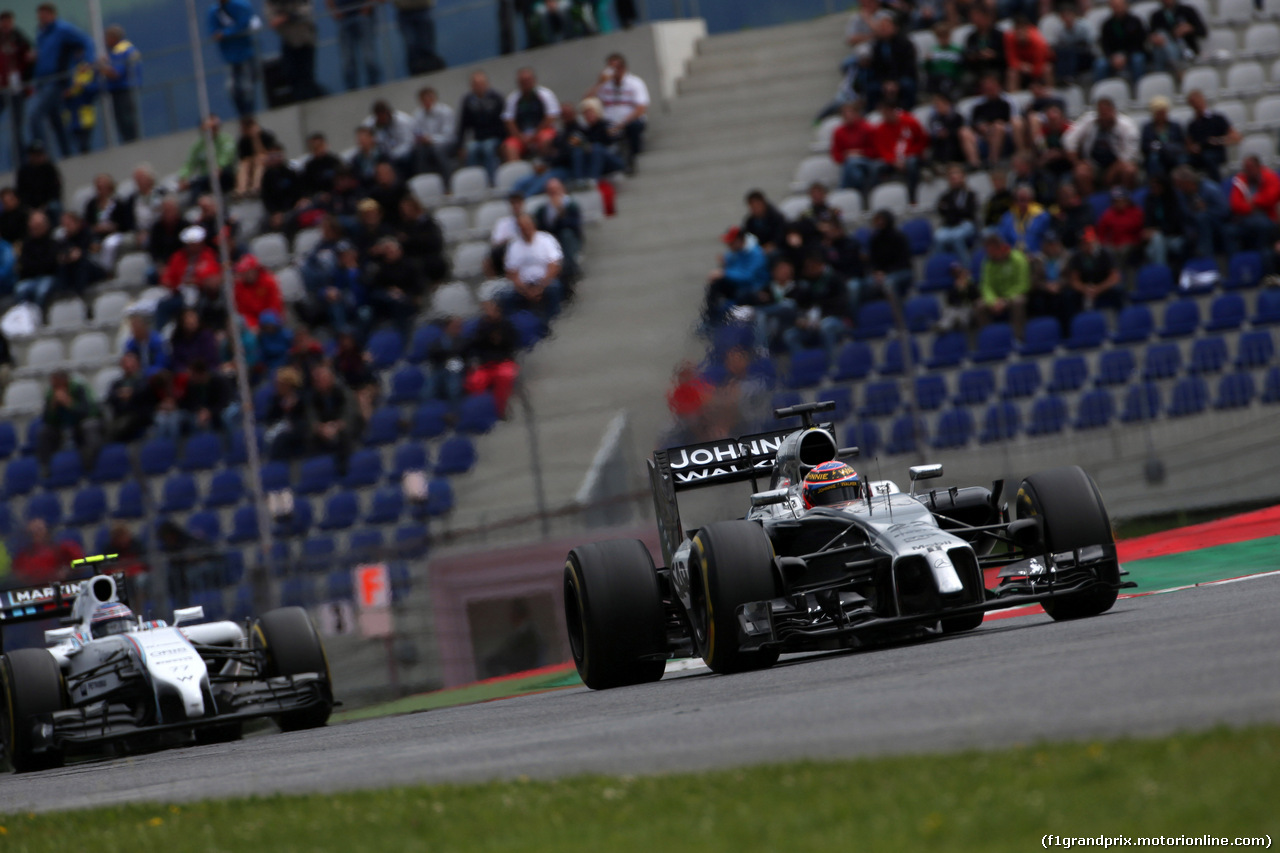 GP AUSTRIA, 20.06.2014- Prove Libere 2, Jenson Button (GBR) McLaren Mercedes MP4-29 davanti a Valtteri Bottas (FIN) Williams F1 Team FW36