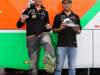 GP AUSTRIA, 19.06.2014- (L to R): Nico Hulkenberg (GER) Sahara Force India F1 e Sergio Perez (MEX) Sahara Force India F1 receive FIFA World Cup themed Alpinestars racing boots