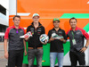 GP AUSTRIA, 19.06.2014- (L to R): Nico Hulkenberg (GER) Sahara Force India F1 e Sergio Perez (MEX) Sahara Force India F1 receive FIFA World Cup themed Alpinestars racing boots