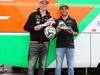 GP AUSTRIA, 19.06.2014- (L to R): Nico Hulkenberg (GER) Sahara Force India F1 e Sergio Perez (MEX) Sahara Force India F1 receive FIFA World Cup themed Alpinestars racing boots