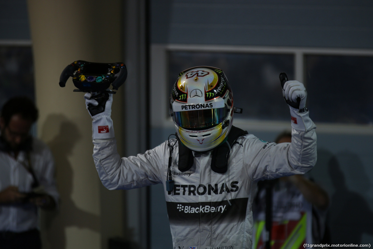GP BAHRAIN, 06.04.2014- Gara, Lewis Hamilton (GBR) Mercedes AMG F1 W05 is celebrating his victory in parc fermee