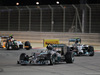 GP BAHRAIN, 06.04.2014- Gara, Lewis Hamilton (GBR) Mercedes AMG F1 W05 fighting with Nico Rosberg (GER) Mercedes AMG F1 W05